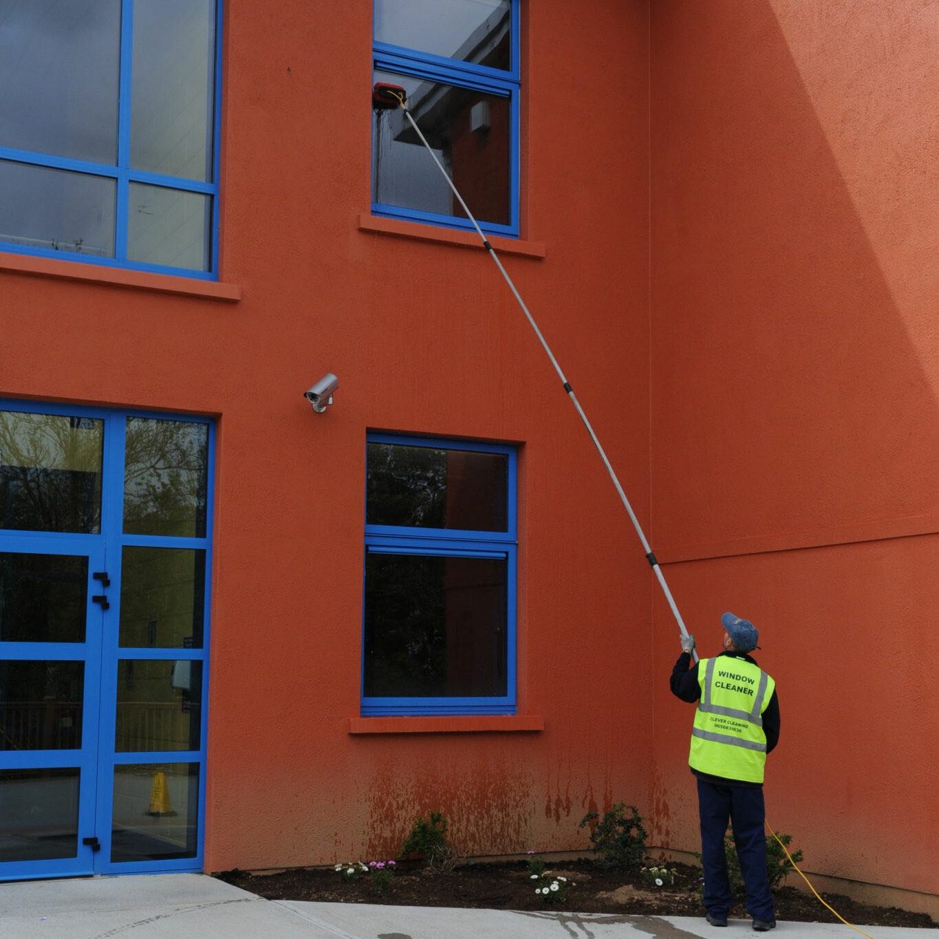 Exterior upper window cleaning using our clever pole system